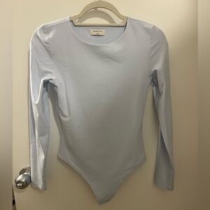 Brand new, never worn bodysuit by Babaton